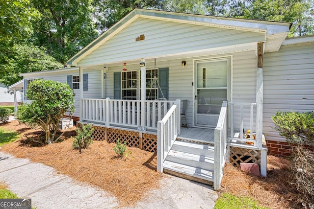 203 Shaw St, Rincon, GA 31326 - view of front of property with a porch