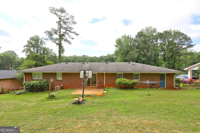 5739 Cobb Mdw, Norcross, GA 30093 - rear view of house featuring a yard, brick siding, and a patio