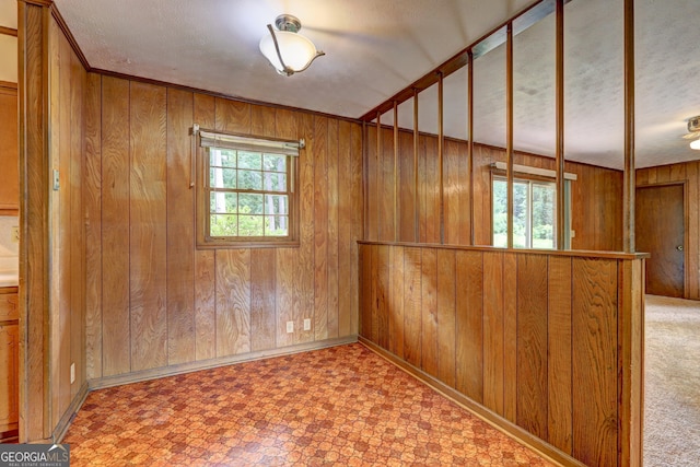 5739 Cobb Mdw, Norcross, GA 30093 - empty room featuring wood walls and tile patterned floors
