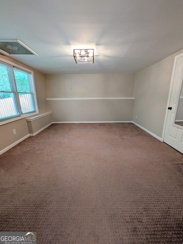 1581 Shetland Pony Ct NW, Suwanee, GA 30024 - spare room featuring baseboards and carpet floors