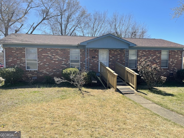 1008 E 12th St, West Point, GA 31833 - ranch-style house with a front lawn, brick siding, and roof with shingles