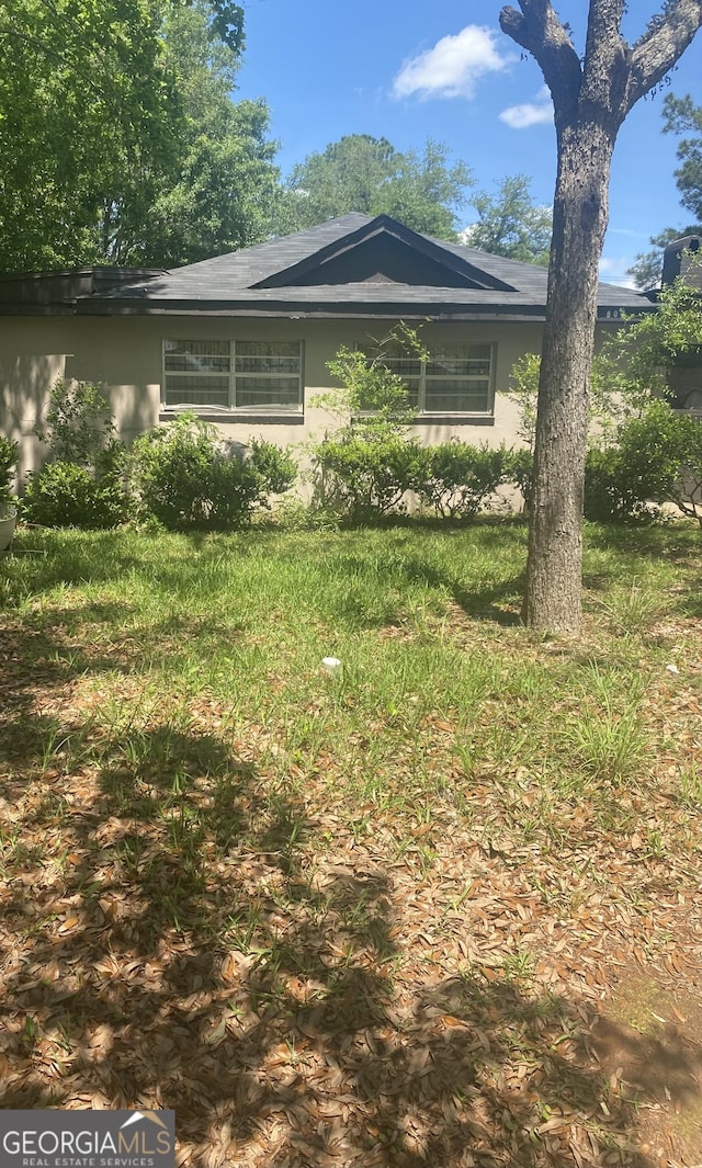 807 Corn Ave, Albany, GA 31701 - view of front of house with stucco siding