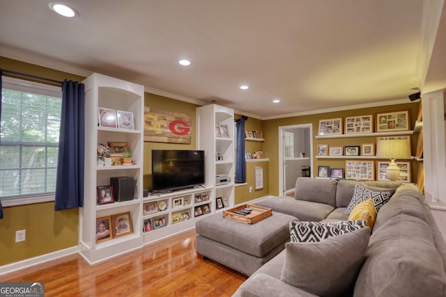 1248 Rockview Ct, Loganville, GA 30052 - living area with ornamental molding, recessed lighting, and light wood-type flooring