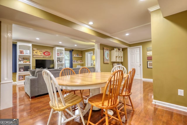1248 Rockview Ct, Loganville, GA 30052 - dining area featuring crown molding, recessed lighting, and wood finished floors