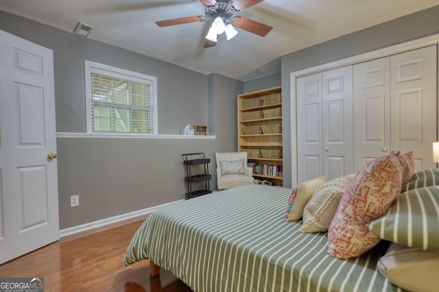 1248 Rockview Ct, Loganville, GA 30052 - bedroom featuring a closet, wood finished floors, and ceiling fan