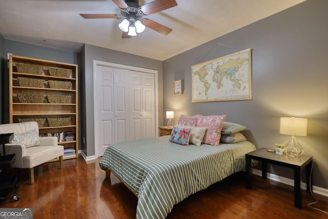 1248 Rockview Ct, Loganville, GA 30052 - bedroom with a closet, wood finished floors, and ceiling fan