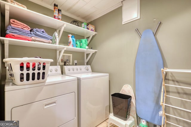 1248 Rockview Ct, Loganville, GA 30052 - laundry area with washer and clothes dryer and crown molding