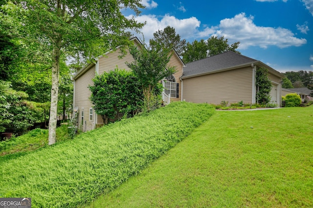 1248 Rockview Ct, Loganville, GA 30052 - view of side of property featuring a lawn and an attached garage