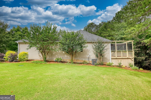1248 Rockview Ct, Loganville, GA 30052 - view of grassy yard with a sunroom