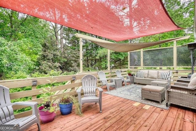 1248 Rockview Ct, Loganville, GA 30052 - wooden deck with outdoor lounge area