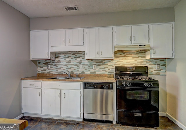 5026 Brittany Dr, Stone Mountain, GA 30083 - kitchen with stainless steel dishwasher, black range with gas cooktop, under cabinet range hood, and decorative backsplash