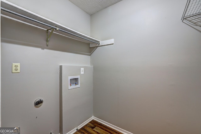 5026 Brittany Dr, Stone Mountain, GA 30083 - laundry room with washer hookup and dark wood-type flooring