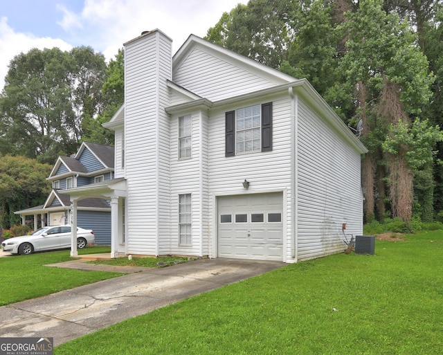 5026 Brittany Dr, Stone Mountain, GA 30083 - view of front of home with a chimney, a front lawn, a garage, and driveway