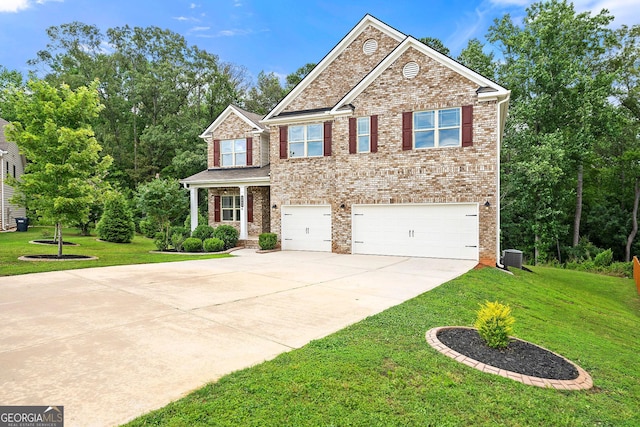 3865 Rifflepool Ct, Douglasville, GA 30135 - craftsman house featuring an attached garage, concrete driveway, a front lawn, and brick siding