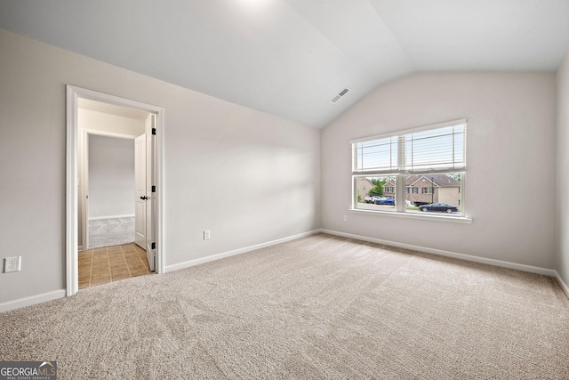 3865 Rifflepool Ct, Douglasville, GA 30135 - unfurnished room featuring carpet floors and vaulted ceiling