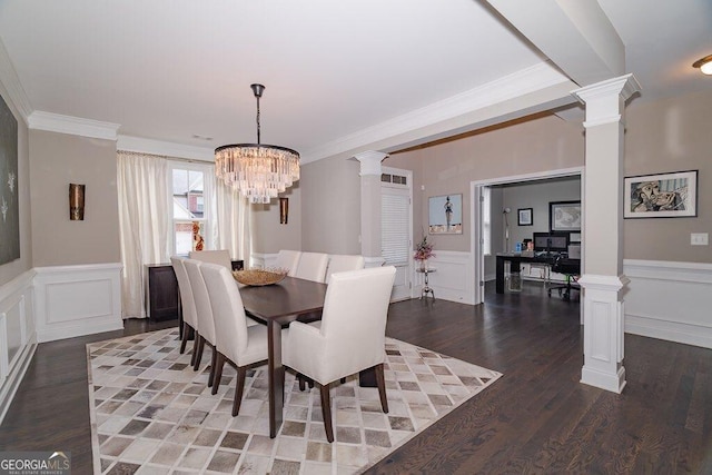 2720 Garonne Way, Cumming, GA 30041 - dining room with ornate columns, a decorative wall, wood finished floors, crown molding, and wainscoting