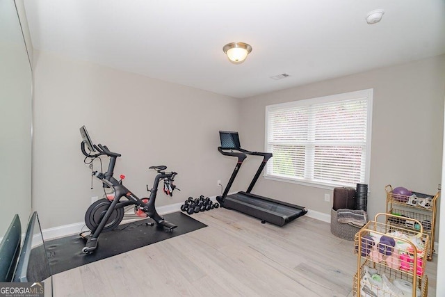 2720 Garonne Way, Cumming, GA 30041 - workout room with baseboards and wood finished floors