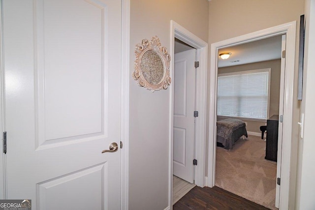 2720 Garonne Way, Cumming, GA 30041 - corridor with baseboards and dark wood-type flooring