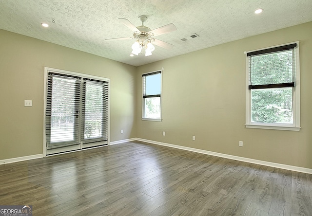 1709 Reese Rd, Sharpsburg, GA 30277 - spare room with a textured ceiling, a ceiling fan, wood finished floors, and recessed lighting