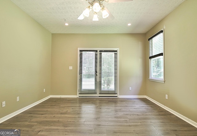 1709 Reese Rd, Sharpsburg, GA 30277 - spare room with a ceiling fan, a textured ceiling, wood finished floors, and recessed lighting