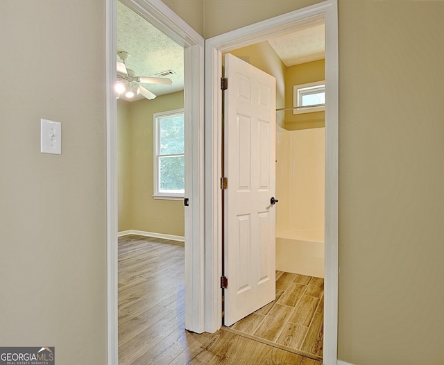 1709 Reese Rd, Sharpsburg, GA 30277 - hallway with wood finished floors