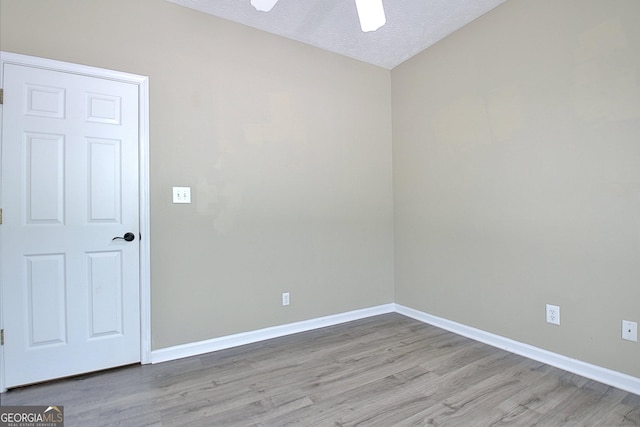 1709 Reese Rd, Sharpsburg, GA 30277 - unfurnished room featuring light wood-style flooring, a ceiling fan, and a textured ceiling