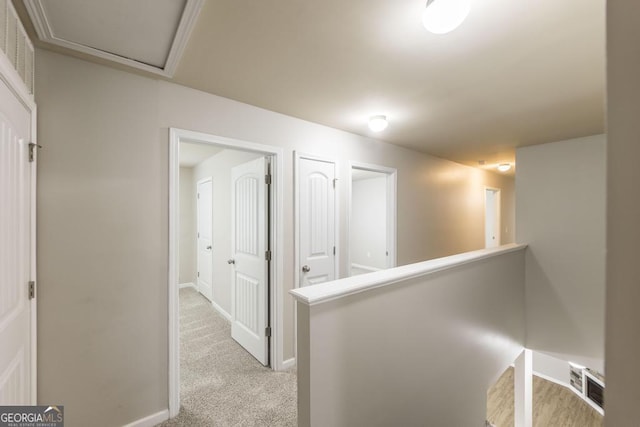 243 Flowing Meadows Dr, Kathleen, GA 31047 - corridor featuring an upstairs landing and light carpet
