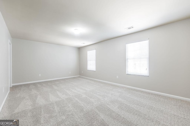 243 Flowing Meadows Dr, Kathleen, GA 31047 - unfurnished room with light carpet and baseboards