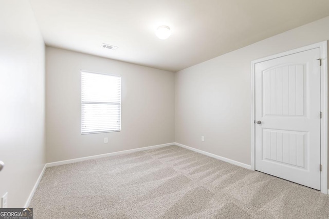 243 Flowing Meadows Dr, Kathleen, GA 31047 - spare room featuring carpet floors and baseboards