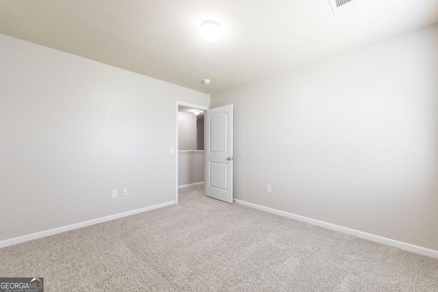 243 Flowing Meadows Dr, Kathleen, GA 31047 - unfurnished room featuring light carpet and baseboards
