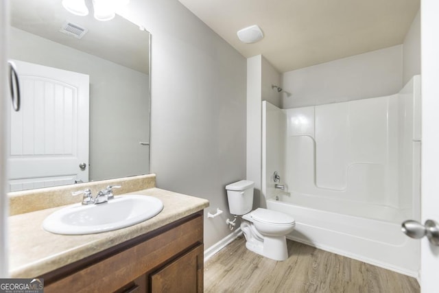 243 Flowing Meadows Dr, Kathleen, GA 31047 - full bathroom with vanity, tub / shower combination, and wood finished floors