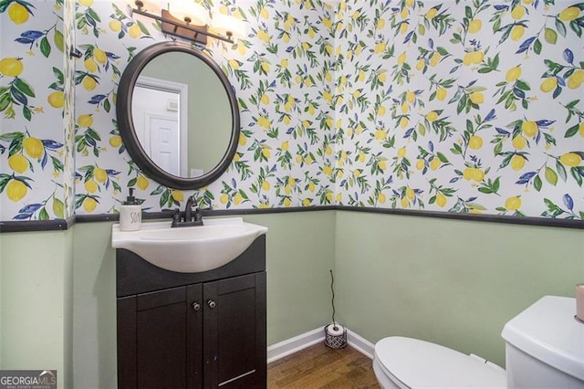 1452 Crooked Tree Cir, Stone Mountain, GA 30088 - bathroom with wallpapered walls, vanity, and wood finished floors