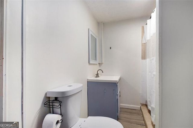 1452 Crooked Tree Cir, Stone Mountain, GA 30088 - full bath featuring vanity, wood finished floors, and a shower with curtain