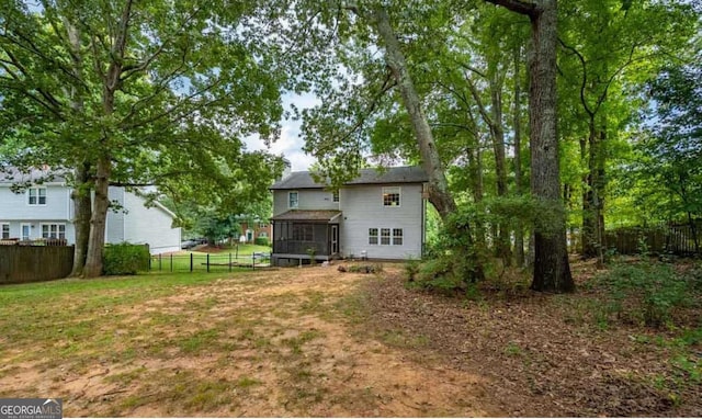 1875 Tree Brooke Ln, Snellville, GA 30078 - fenced backyard with a sunroom
