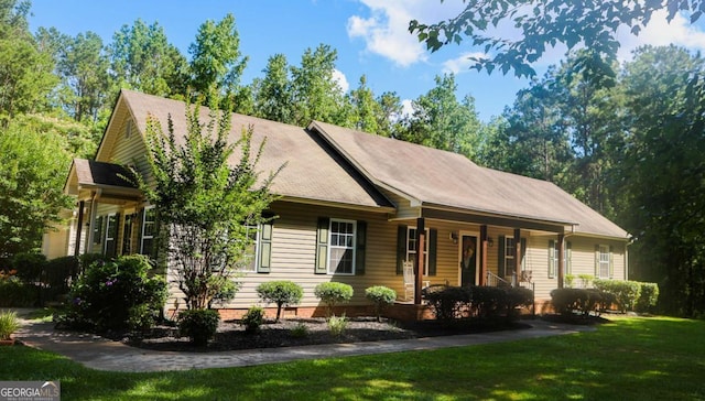 1665 Jackson Lake Rd, Mansfield, GA 30055 - ranch-style house featuring a front yard and a porch