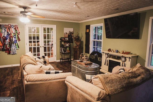 1665 Jackson Lake Rd, Mansfield, GA 30055 - living room featuring a ceiling fan, wood finished floors, french doors, and crown molding