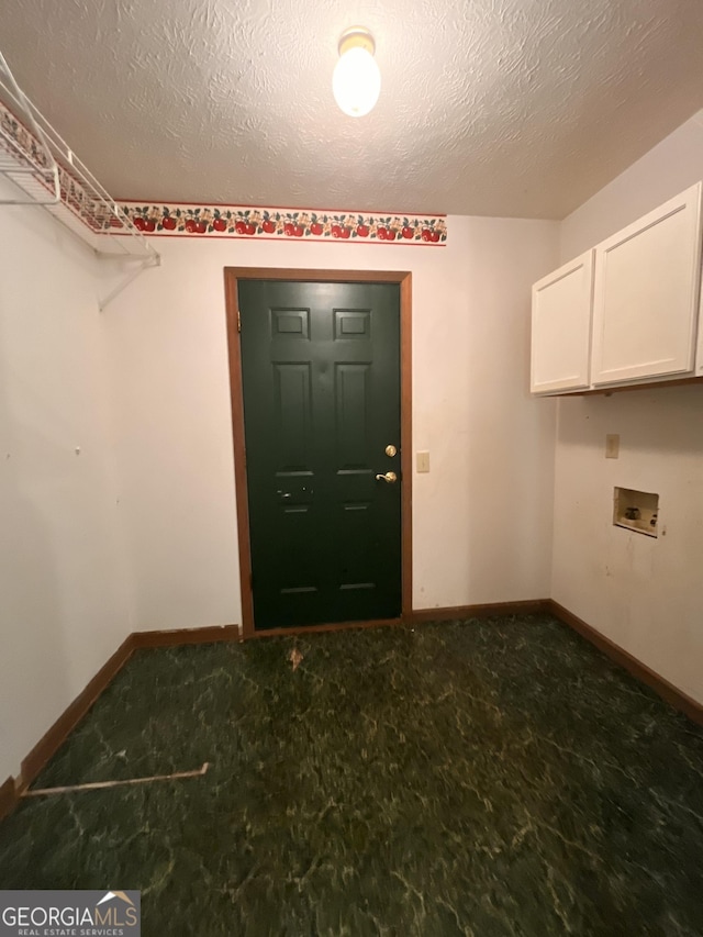 172 Fred Henry Ln, Clayton, GA 30525 - laundry room featuring cabinet space and hookup for a washing machine