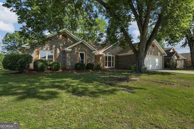 5437 Chatham Woods Ct, Columbus, GA 31907 - view of front of home with a garage, driveway, a front yard, and brick siding