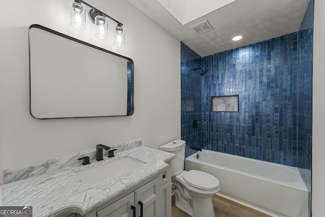 5437 Chatham Woods Ct, Columbus, GA 31907 - bathroom featuring vanity, wood finished floors, and bathing tub / shower combination