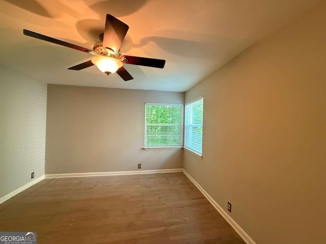40 Dunwoody Springs Dr, Atlanta, GA 30328 - spare room with wood finished floors and a ceiling fan