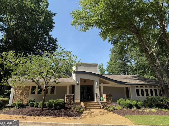 40 Dunwoody Springs Dr, Atlanta, GA 30328 - view of front of property featuring stone siding, stucco siding, and french doors