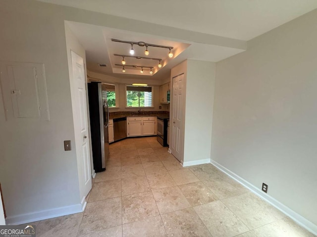 40 Dunwoody Springs Dr, Atlanta, GA 30328 - kitchen with a raised ceiling, stainless steel appliances, electric panel, and dark countertops