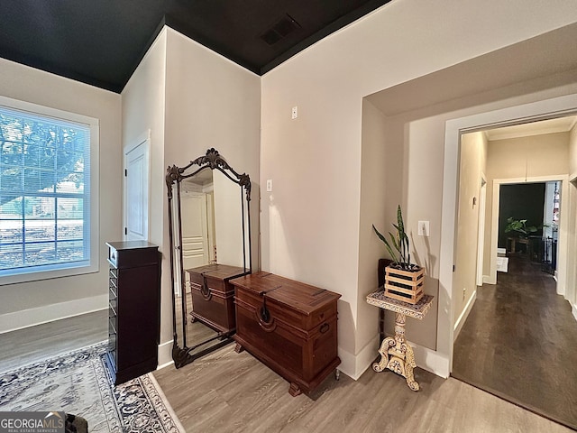 6192 Collins St NE, Covington, GA 30014 - hallway featuring light wood-style flooring