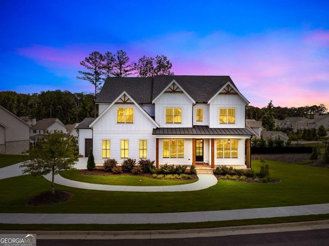 6080 Simone St, Acworth, GA 30101 - modern farmhouse style home with board and batten siding, a lawn, a standing seam roof, a porch, and a metal roof