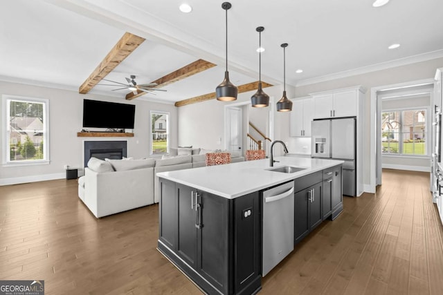 6080 Simone St, Acworth, GA 30101 - kitchen featuring stainless steel dishwasher, refrigerator with ice dispenser, dark cabinets, ceiling fan, and white cabinetry