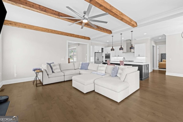 6080 Simone St, Acworth, GA 30101 - living room with beam ceiling, a ceiling fan, recessed lighting, dark wood finished floors, and ornamental molding