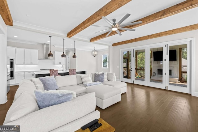 6080 Simone St, Acworth, GA 30101 - living room with beam ceiling, dark wood-style floors, a ceiling fan, ornamental molding, and recessed lighting