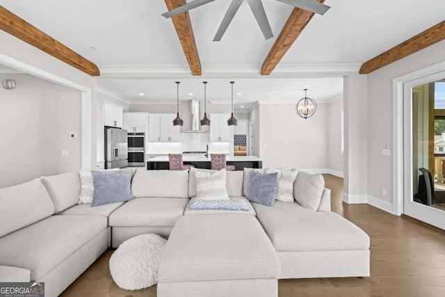 6080 Simone St, Acworth, GA 30101 - living area featuring ceiling fan, beam ceiling, recessed lighting, dark wood-style floors, and a chandelier