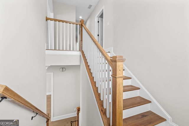 6080 Simone St, Acworth, GA 30101 - staircase featuring recessed lighting and baseboards
