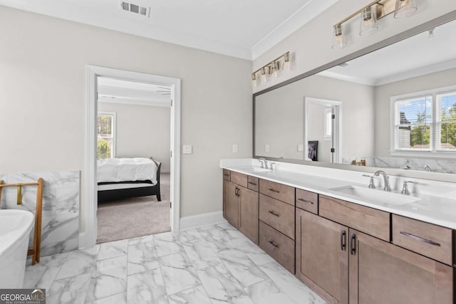 6080 Simone St, Acworth, GA 30101 - ensuite bathroom featuring double vanity, marble finish flooring, a freestanding tub, and ornamental molding